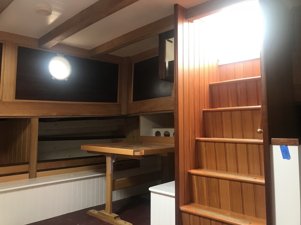 This is another view of the Aft Cabin looking towards the Starboard aft corner where a mess table and storage cabinet have been installed.