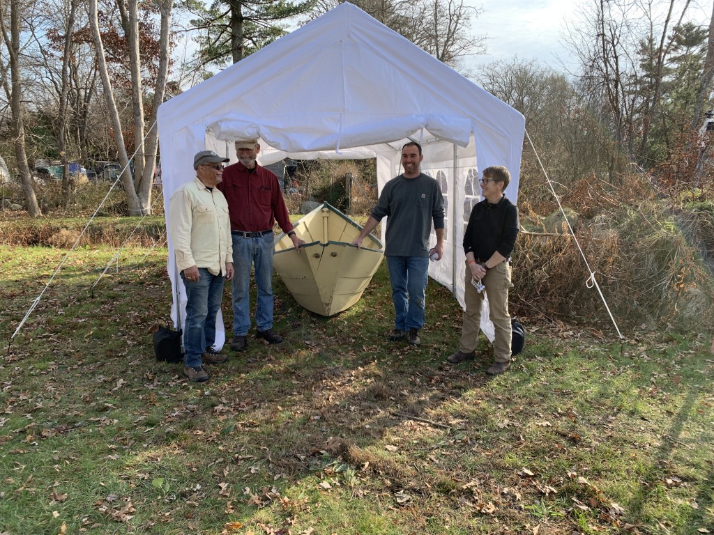 Tent erected, one dory in place. left to right: SEMA President Julius Britto, former Commissioner Fred Sterner, Coalition captain, Sam Lyons, Captain Tiffany Krihwan. Also not shown, Joe Pachedo, Gil Perry, forner Commissioner Gene Monteiro and Mary Anne McQuillan