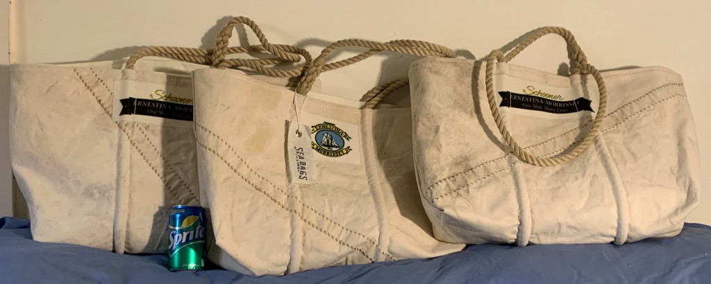 SeaBags from Ernestina-Morrissey's sails. You can see the logo on the center bag and the banner on the reverse flanking it.
