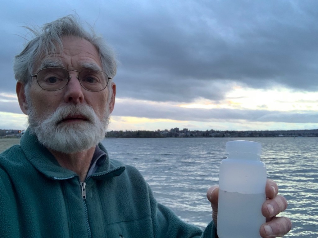 Eric Kaufmann with water collected at Vancouver, BC