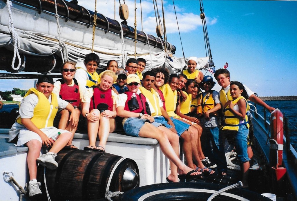 2002 ~ The crew of CBC gathered on the aft cabin after a successful overnight voyage with an anchorage inside Penikese, Cuttyhunk and Nashawena Islands in the Elizabeth Island Chain.