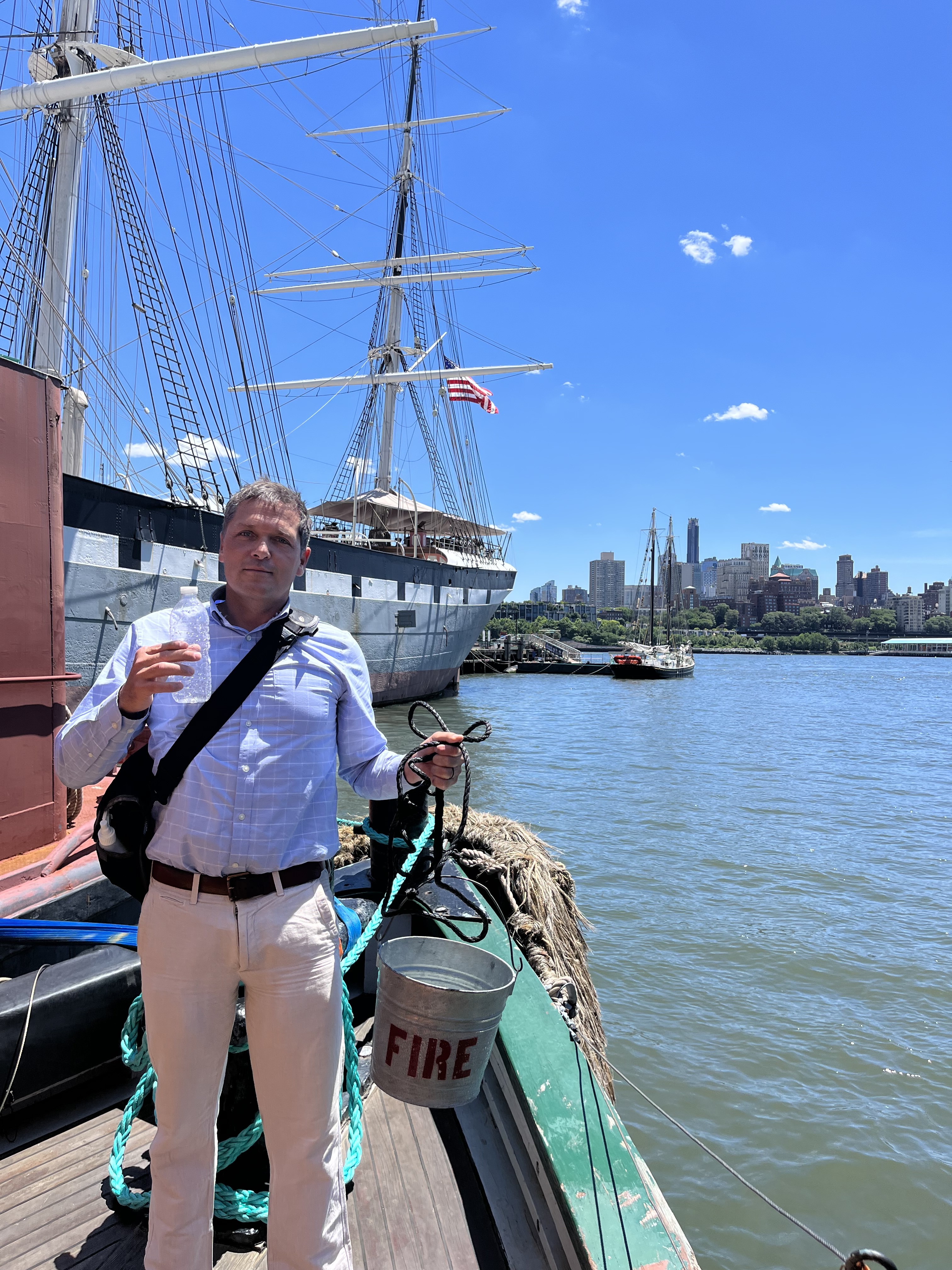 Captain Jonathan Boulware< President and CEO collected water from the deck of the Tugboat W.O. Decker, part of the South Street Seaport Museum's fleet, Pier 16, Manhattan, NY, NY