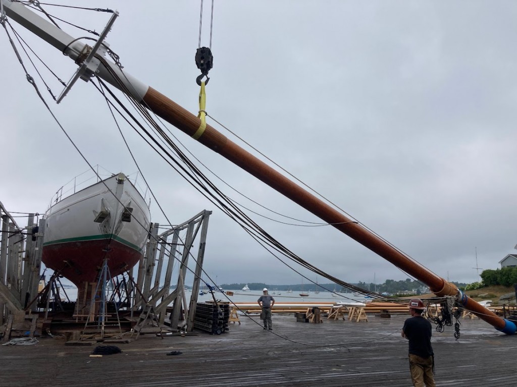 The spars are "dressed" with all the standing rigging, carefully gathered up ready to be deployed when the mast is in place.